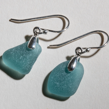 Load image into Gallery viewer, Small deep teal sea glass earrings made with sterling silver bales and ear wires
