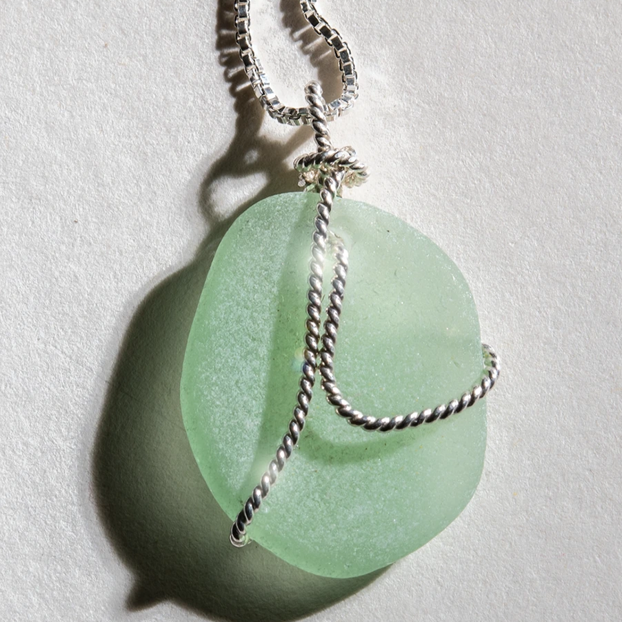 Sea-Mist aqua-green sea glass overlaid with sterling silver on a 24 inch sterling chain. 
