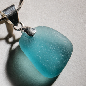 Rare, large, bright-aqua sea glass in a simple, elegant sterling setting on a 24 inch sterling silver chain