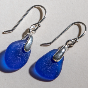 Rare cobalt blue sea glass earrings with sterling settings and sterling ear wires. Small size